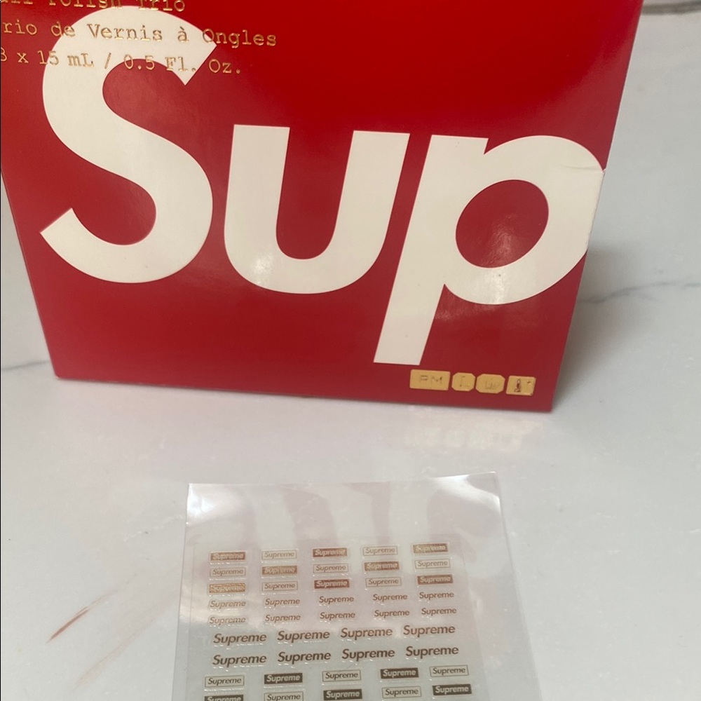 Supreme Gold and White Logo Sticker nails